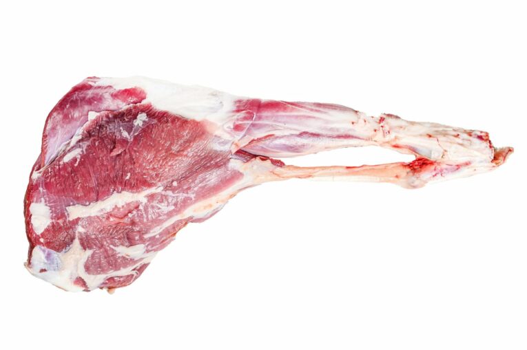 goat-leg-with-pepper-garlic-raw-farm-meat-isolated-white-background-scaled-1.jpg